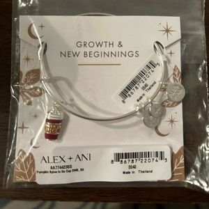 NWT Alex and Ani Pumpkin Spice “cup of coffee” silver bracelet. Still in package